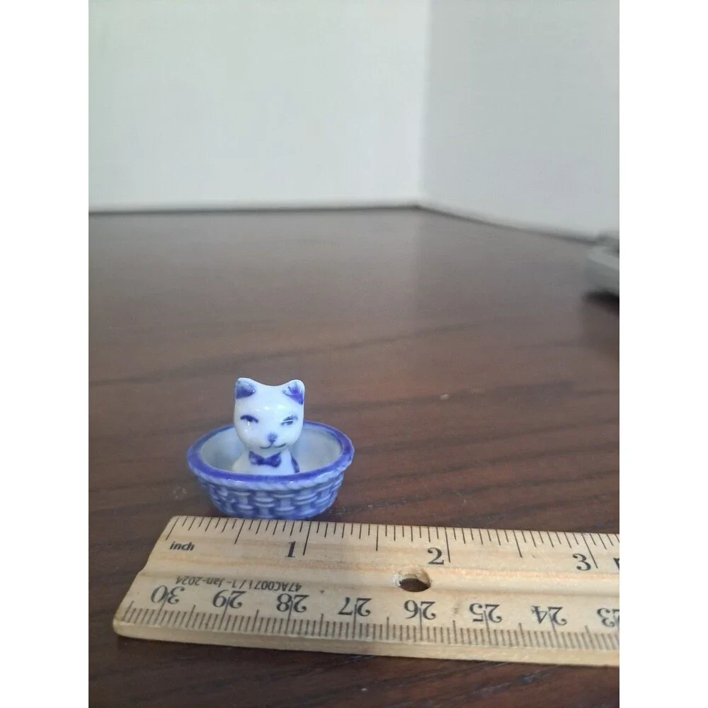 Miniature Delft Style White And Blie Kitten In A Basket Porcelain Figurine